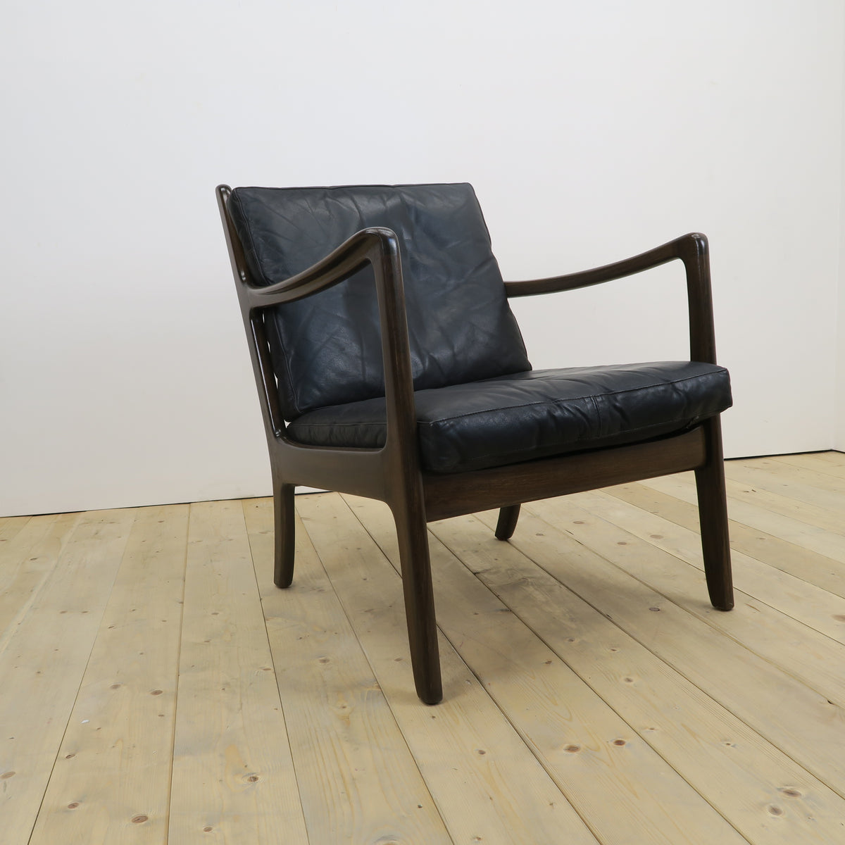 Poltrona scandinava in teak e pelle, anni ’60