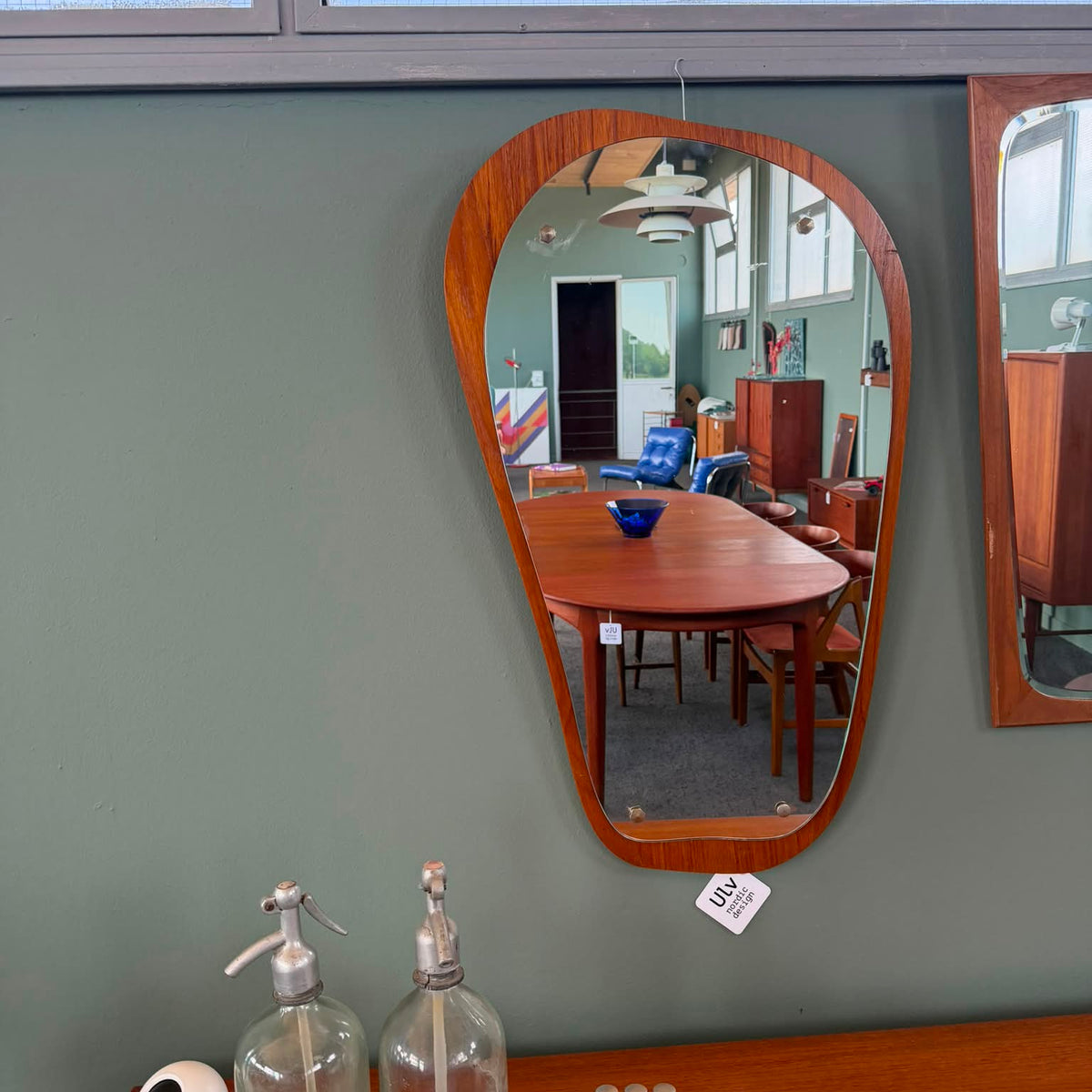 Organic shaped teak wood mirror