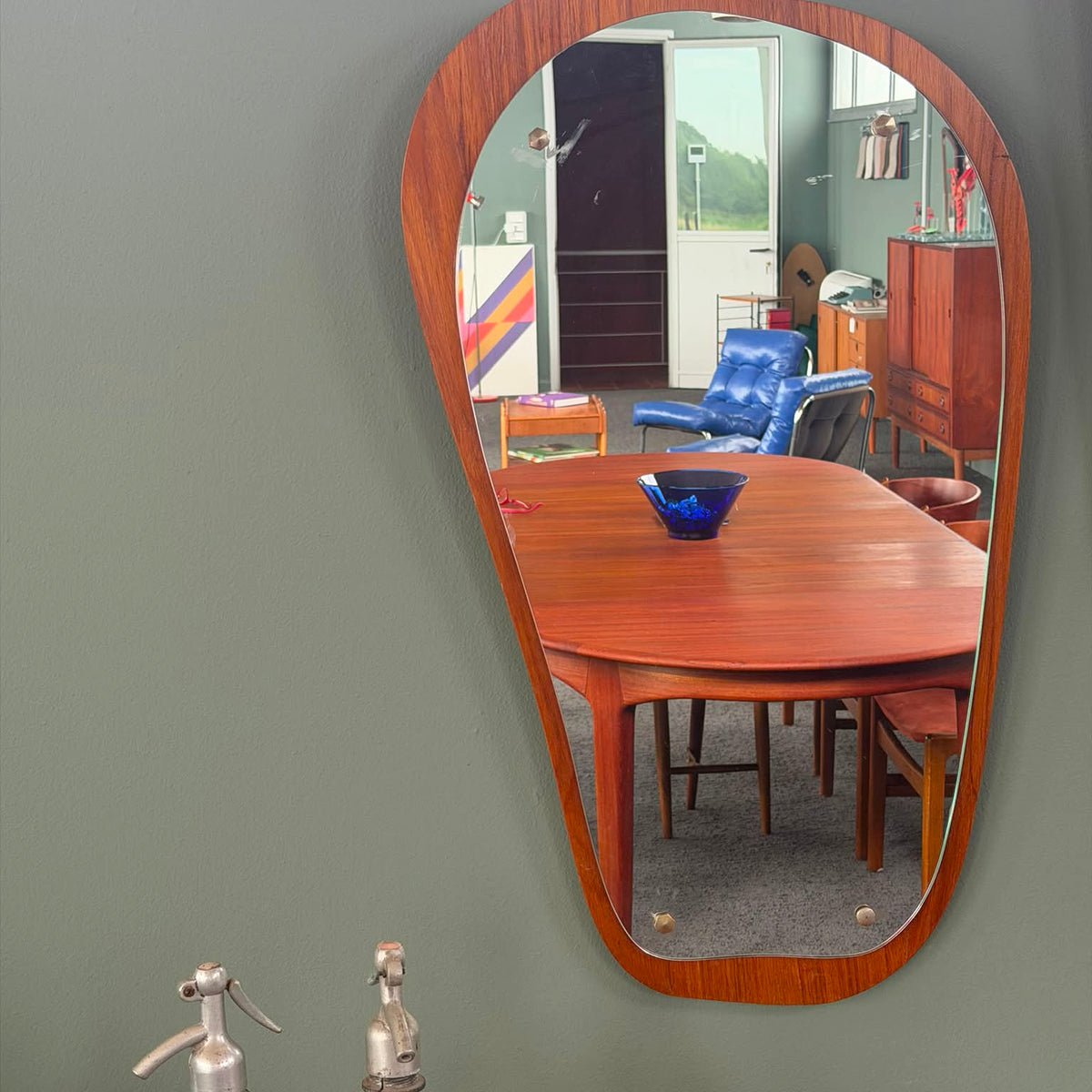 Organic shaped teak wood mirror
