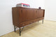 Teak sideboard with sliding doors and drawers, 1960s
