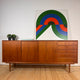 Credenza in teak danese con ante scorrevoli e cassetti, anni ’60