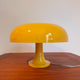 Lampada da tavolo Nessino di Artemide gialla, Giancarlo Mattioli
