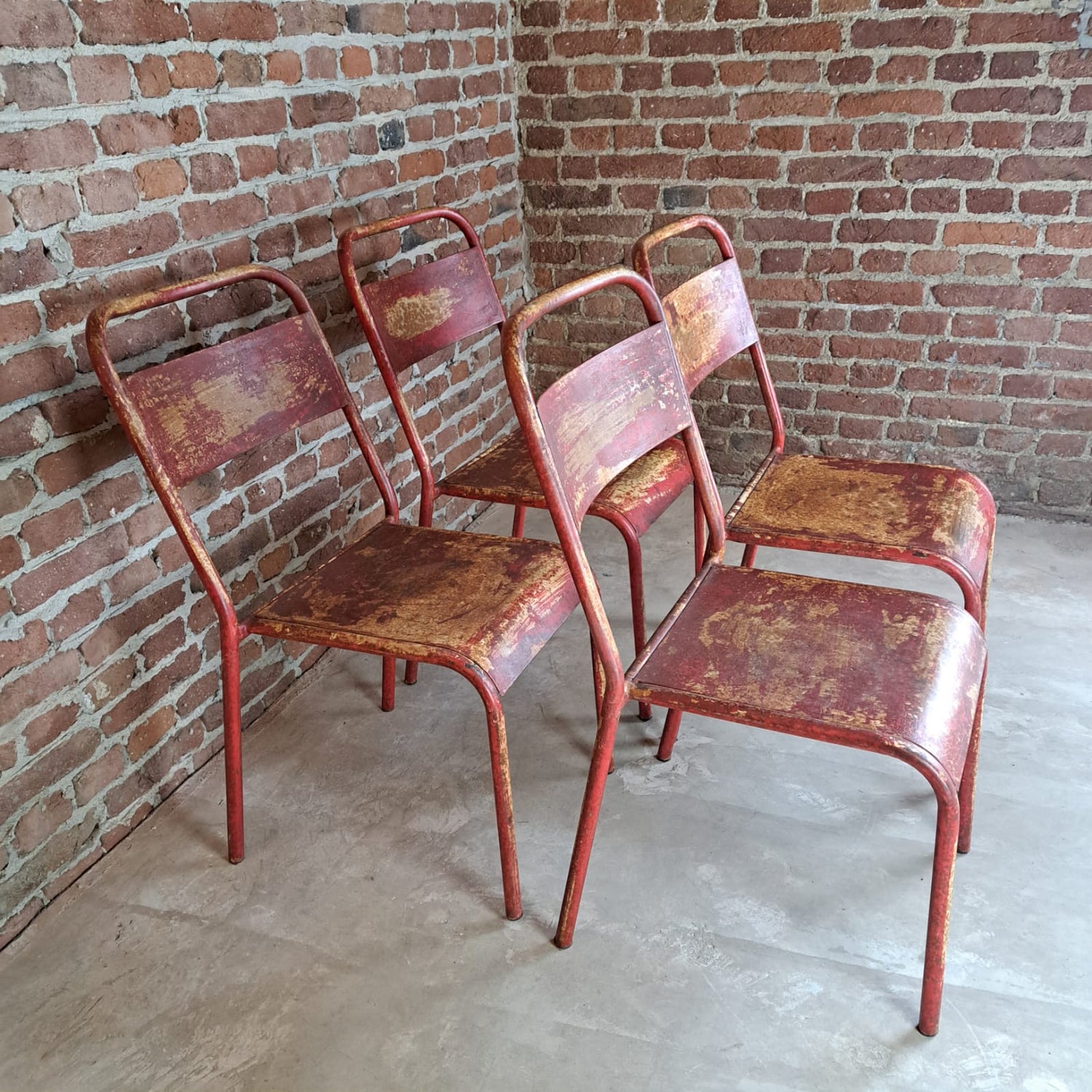 Set di quattro sedie da giardino in metallo