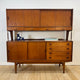 Highboard in teak con ante scorrevoli e cassetti, Danimarca 1960