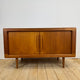 Sideboard Dyrlund in teak con ante a scomparsa e cassetti interni, Danimarca 1960
